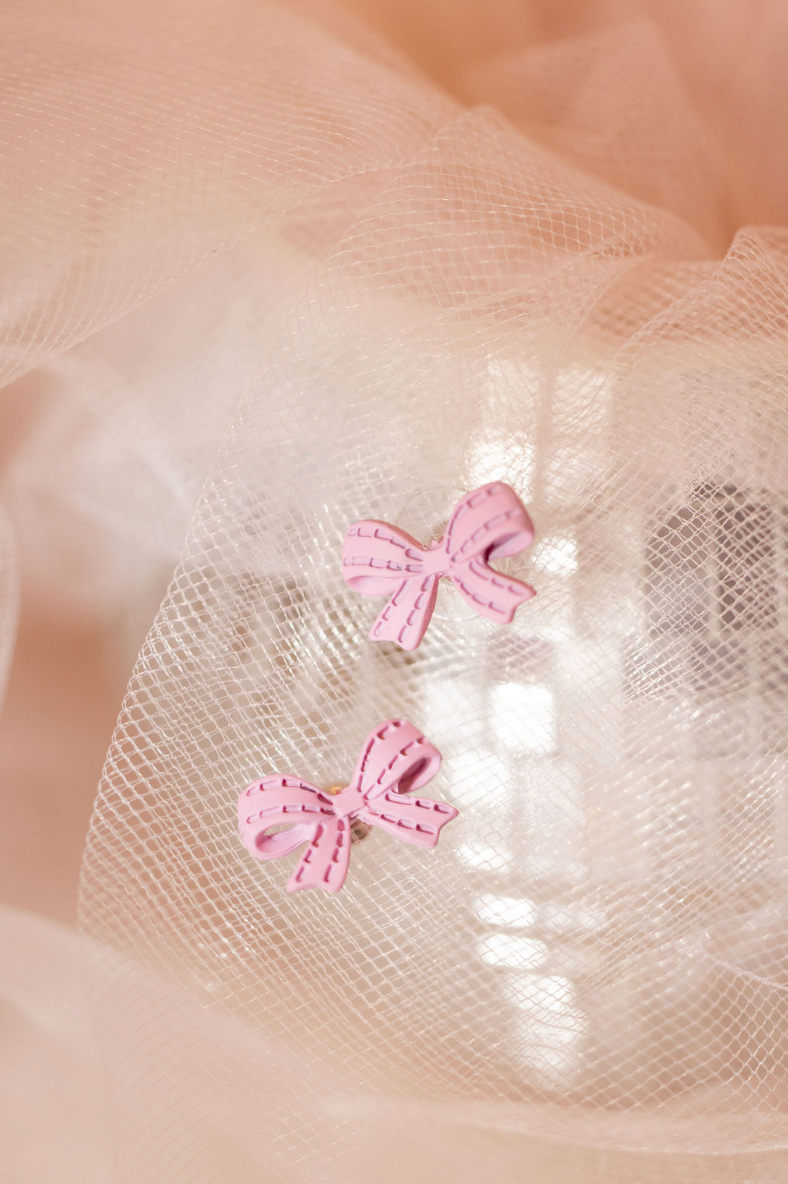 Pink bow studs